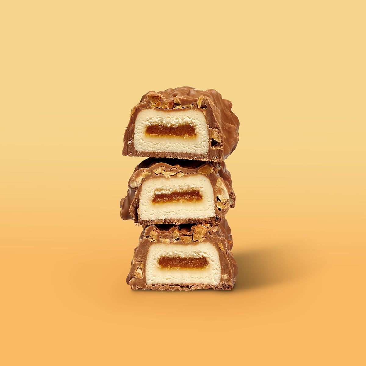 FilledProteinRiegel_PeanutCaramel_02-min Filled Protein Riegel Peanut Caramel – Aufgeschnittene Riegel mit sichtbarer Füllung | Aldi Sports