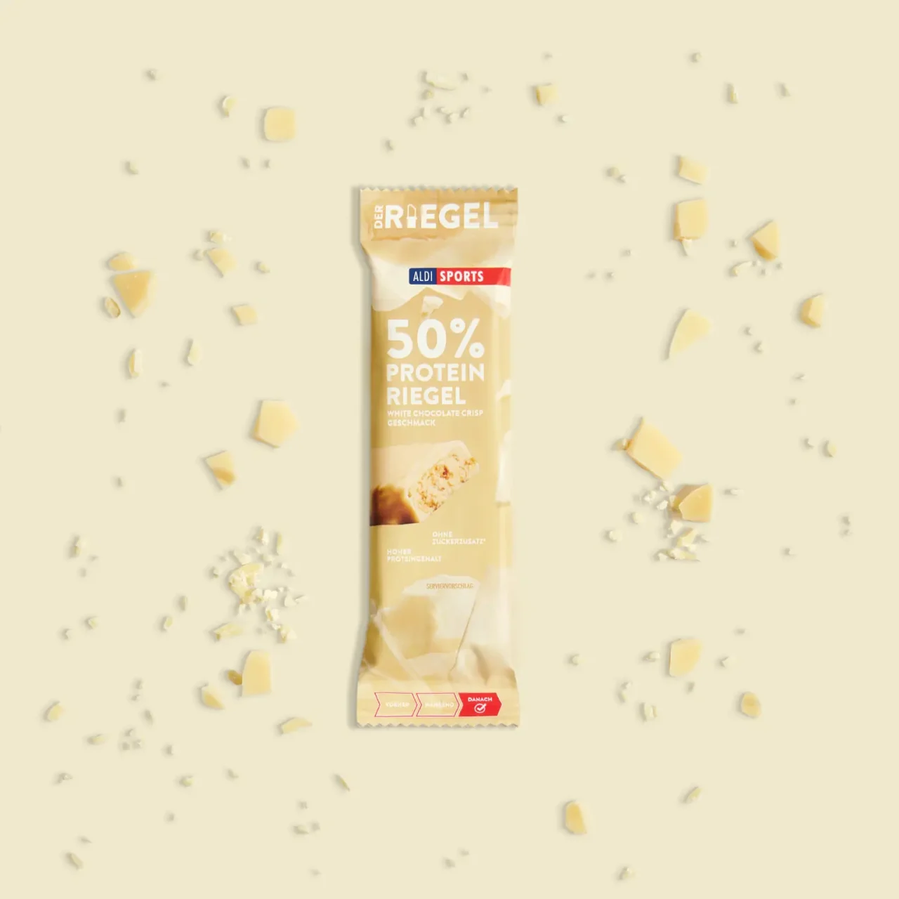 ProteinRiegel_WhiteChocolateCrisp_04 50% Protein Riegel White Chocolate Crisp – Zutaten um das Produkt herum | Aldi Sports