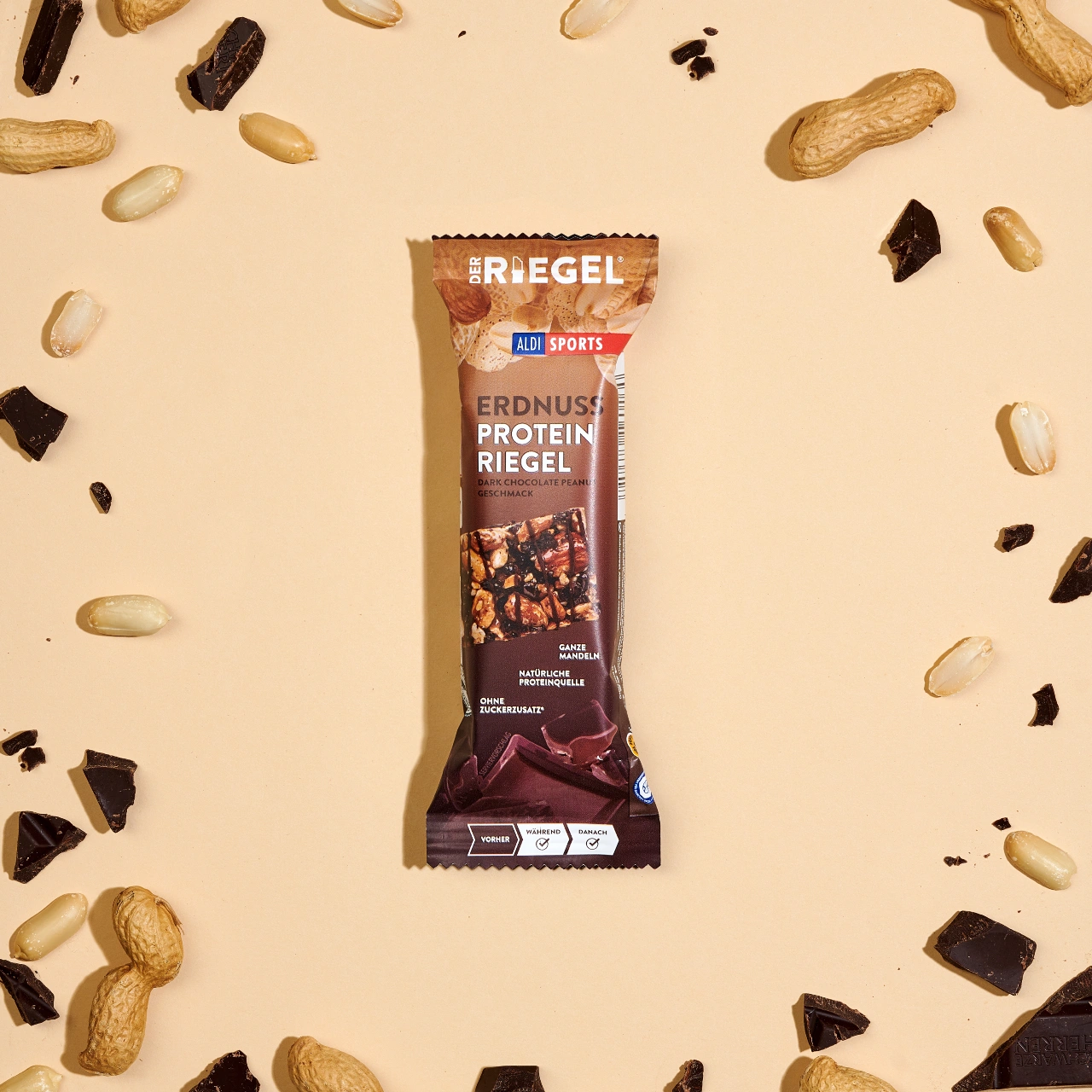 Erdnuss Protein Riegel Dark Chocolate_03 Erdnuss Protein Riegel Dark Chocolate Peanut – Zutaten um das Produkt herum | Aldi Sports
